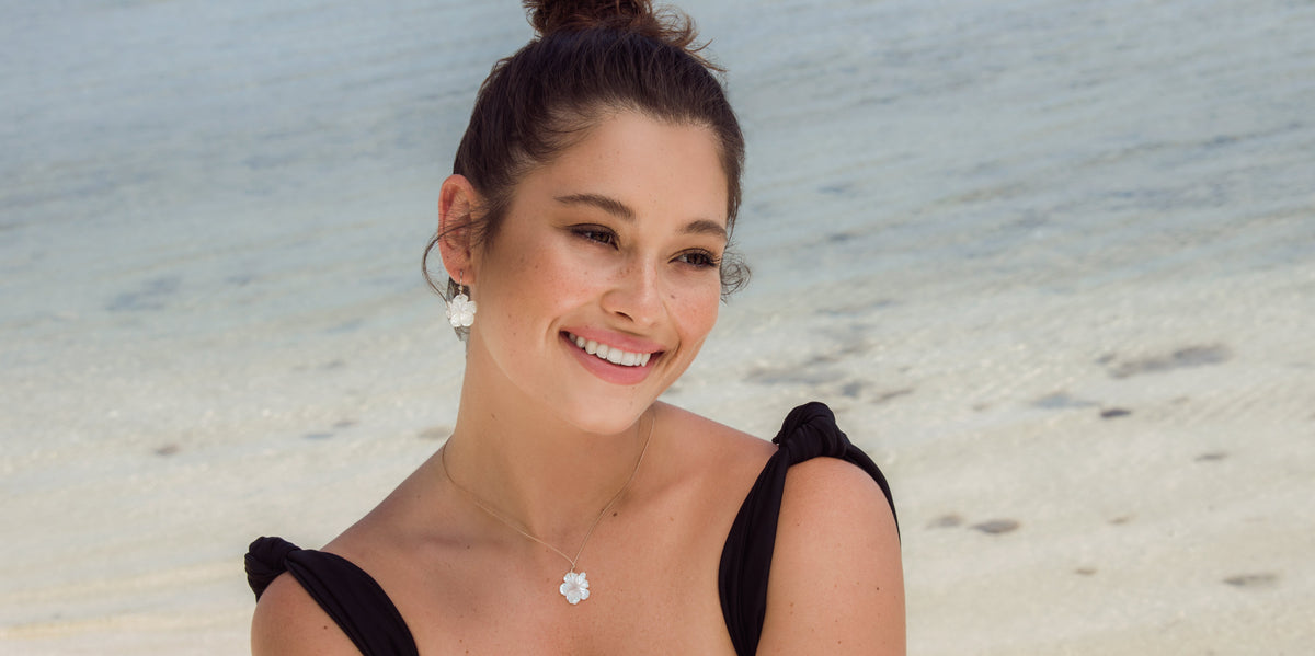 Pua / Kai O Aloha (Carved Shell Collection) — handmade carved shell necklaces and earrings.