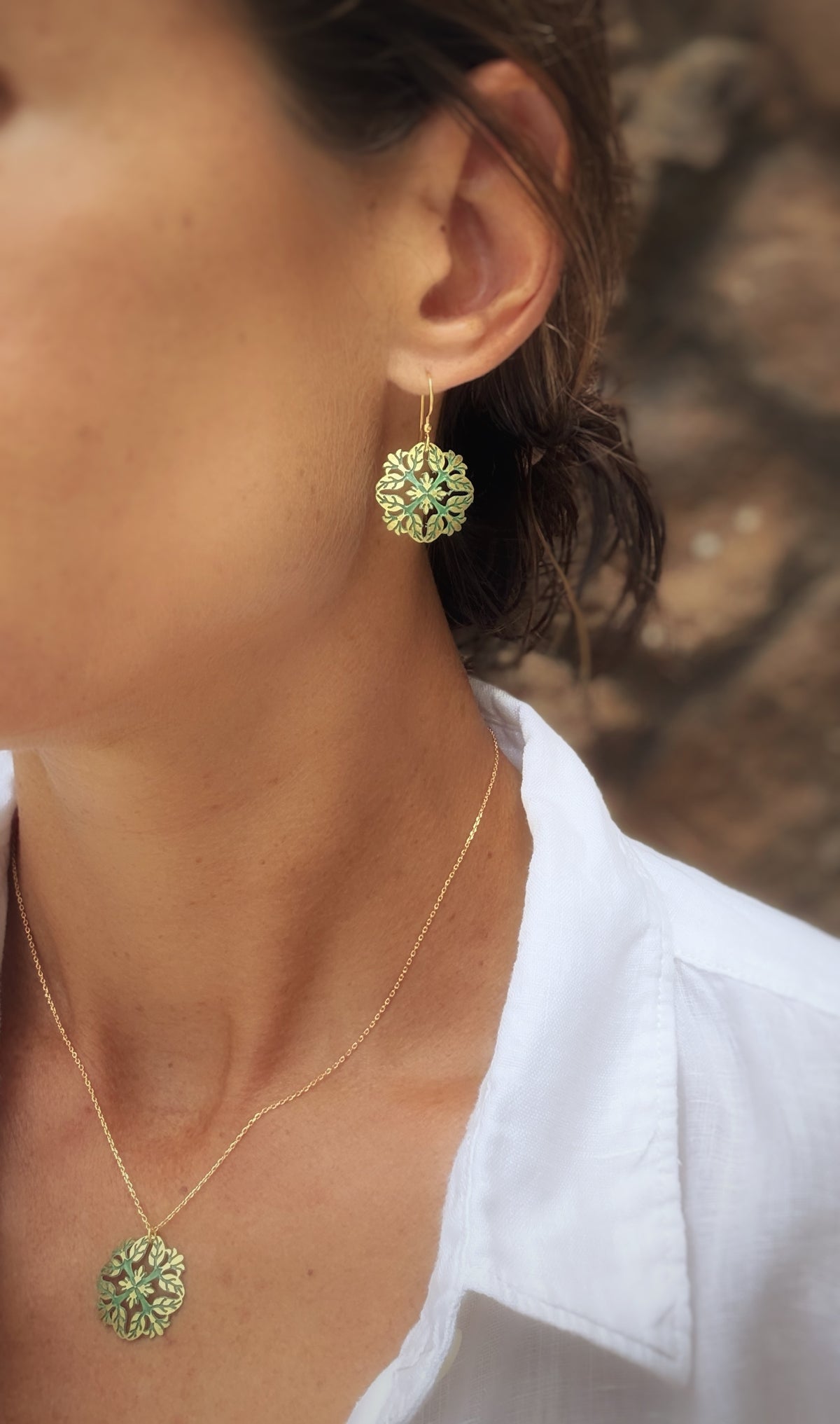 Leighton Lam Designs Pikake Patina Holiday jewelry set featuring floral and patina finish pieces displayed on a white background