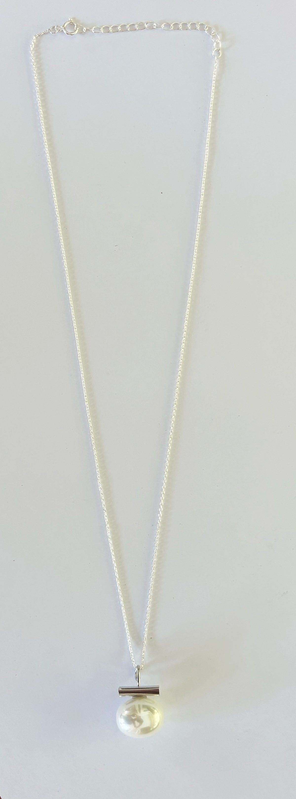 Leighton Lam Designs Ohelo Pearl Necklace featuring elegant white pearls on a delicate chain.