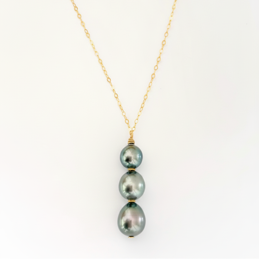 Avae Tahitian necklace by Leighton Lam Designs featuring black Tahitian pearls on a delicate gold chain.