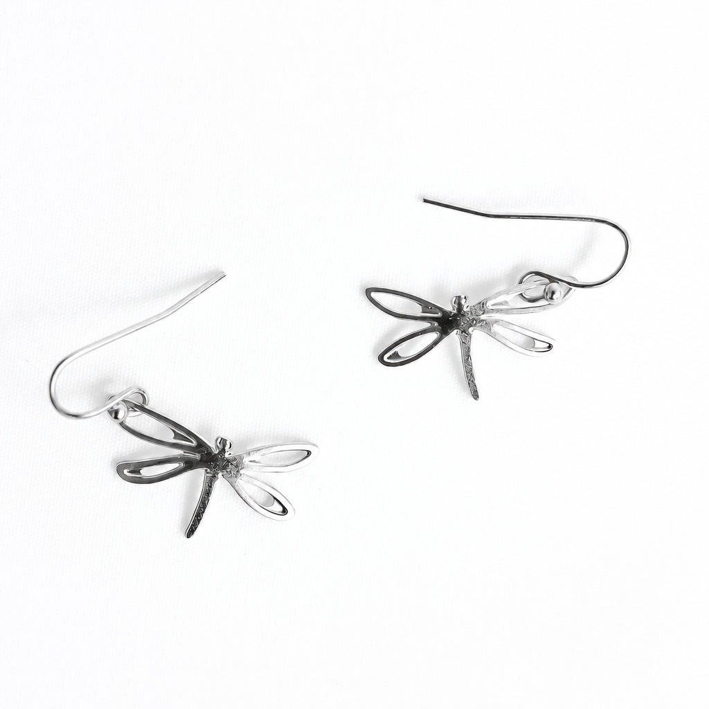 A pair of gold dragonfly wire earrings on a clean white background.