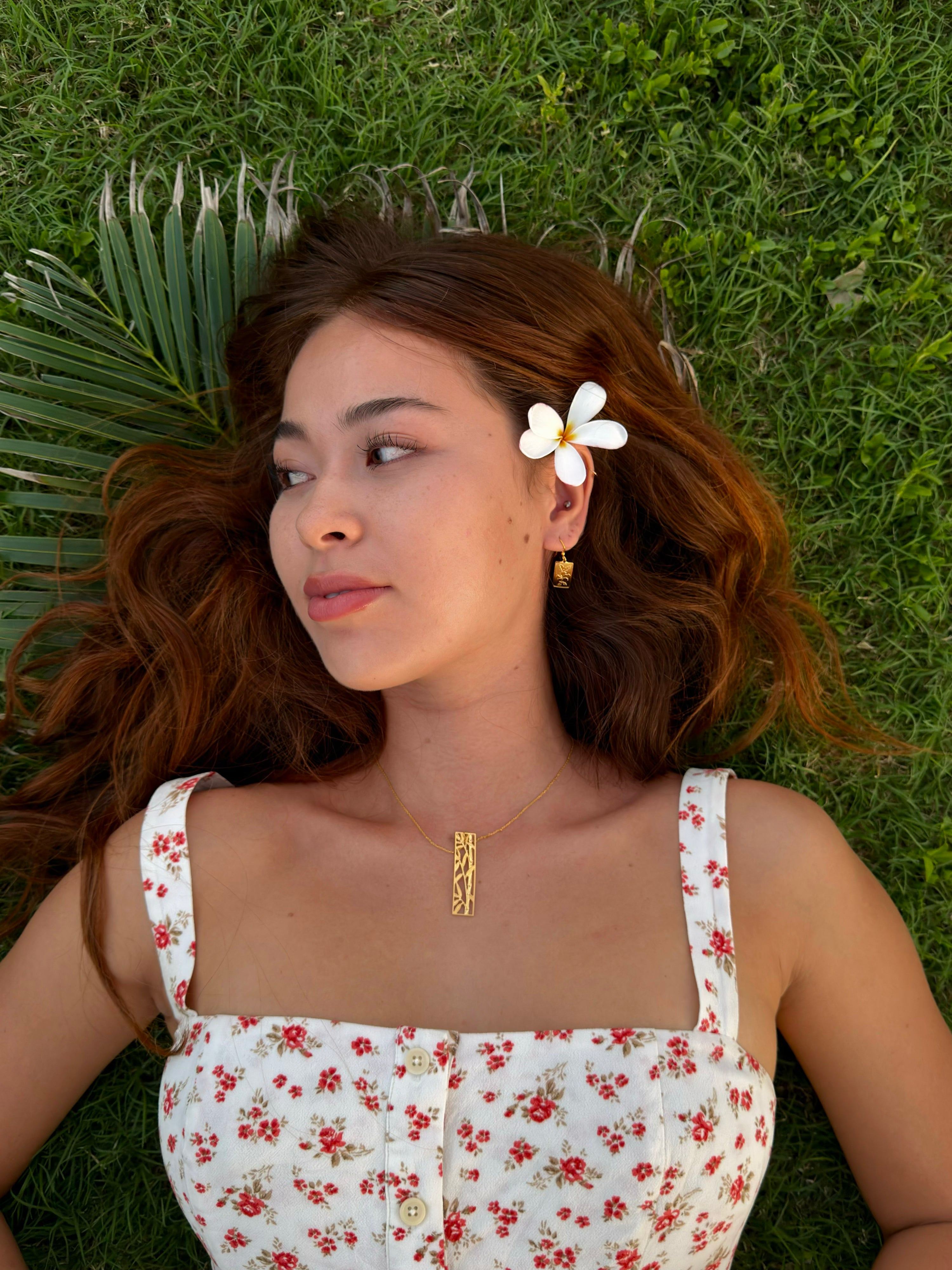Leighton Lam Designs bamboo necklace featuring natural bamboo beads and a stylish, minimalist design on a neutral background.